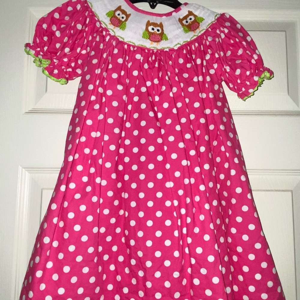 24 months smocked little girls dress. Gently used like new condition.